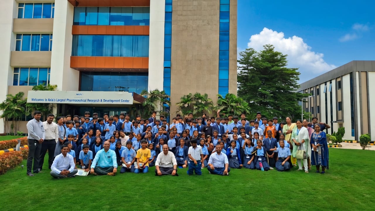 StrategyM students and mentors gathered outside a pharmaceutical research and development campus